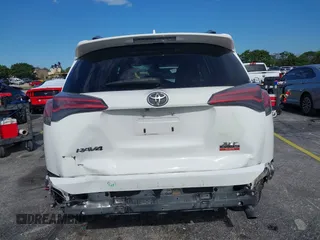 2018 Toyota RAV4 XLE with VIN JTMWFREV4JJ753365, listed as a IAAI auction lot 42550177 with 42,607 mi miles and . Bid and sale history available at DreamBid. Image 6.