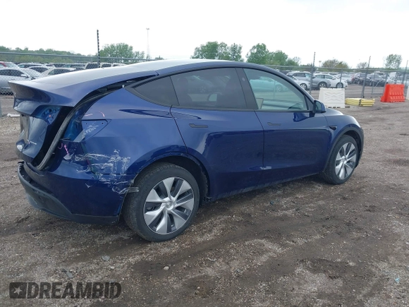 2023 Tesla Model Y Long Range z VIN 7SAYGDEE0PF840787, wystawiony jako IAAI lot #42172489 z przebiegiem 16 314 mil mil oraz . Historia ofert i sprzedaży dostępna na DreamBid. Obrazek 4.