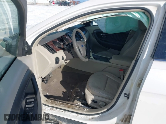 2011 Ford Taurus SEL z VIN 1FAHP2EW2BG143071, wystawiony jako IAAI lot #41538097 z przebiegiem 126 668 mil mil oraz . Historia ofert i sprzedaży dostępna na DreamBid. Obrazek 5.
