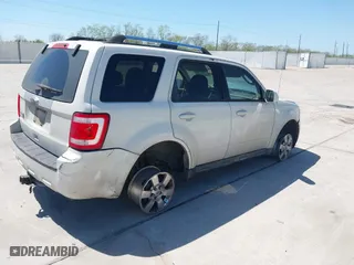 2011 Ford Escape Limited with VIN 1FMCU0E70BKB63399, listed as a IAAI auction lot 41862288 with 238,822 mi miles. Bid and sale history available at carsss.com. Image 4.