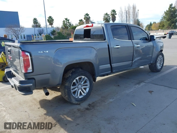 2018 GMC Canyon 4WD SLT with VIN 1GTP6DE11J1302382, listed as a IAAI auction lot 41318784 with 114,981 mi miles. Bid and sale history available at carsss.com. Image 4.