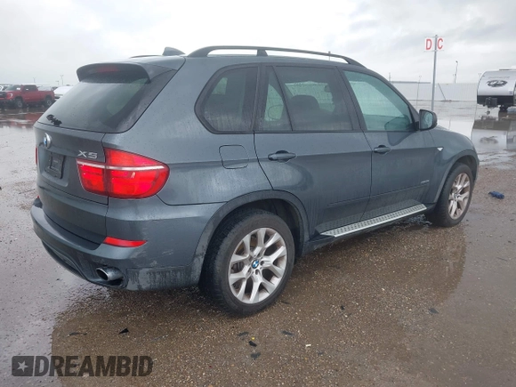 2011 BMW X5 35i z VIN 5UXZV4C59BL404339, wystawiony jako IAAI lot #42167977 z przebiegiem 109 378 mil mil oraz . Historia ofert i sprzedaży dostępna na DreamBid. Obrazek 4.