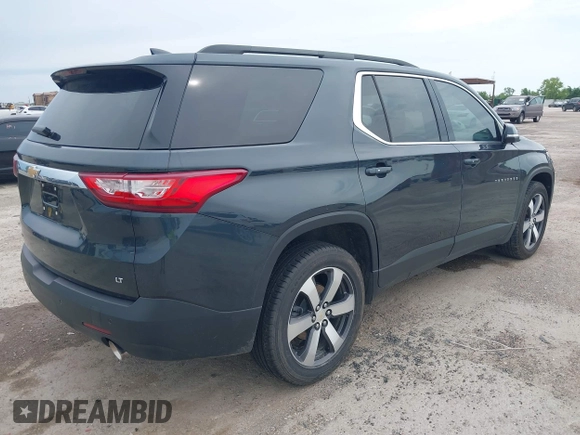 2021 Chevrolet Traverse LT with VIN 1GNERHKW4MJ191814, listed as a IAAI auction lot 42185544 with 87,493 mi miles and . Bid and sale history available at DreamBid. Image 4.