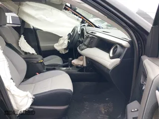 2016 Toyota RAV4 XLE with VIN 2T3WFREV9GW276278, listed as a IAAI auction lot 41906293 with 112,000 mi miles. Bid and sale history available at carsss.com. Image 5.