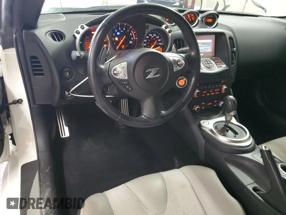 2013 Nissan 370Z Touring z VIN JN1AZ4EH5DM383466, wystawiony jako Copart lot #85704054 z przebiegiem 37 892 mil mil oraz Szkoda całkowita • Salvage title. Historia ofert i sprzedaży dostępna na DreamBid. Obrazek 8.