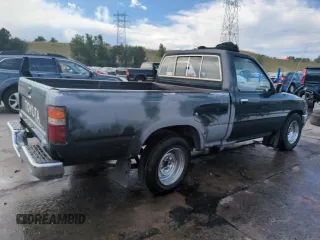 1994 Toyota Pickup DX with VIN JT4RN81PXR5174113, listed as a Copart auction lot 64211905 with 209,694 mi miles and Salvage title. Bid and sale history available at DreamBid. Image 3.