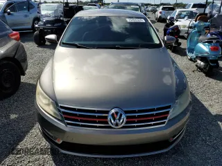 2013 Volkswagen CC Sport with VIN WVWBN7AN0DE508202, listed as a Copart auction lot 74400324 with 162,037 mi miles and Salvage Title. Bid and sale history available at carsss.com. Image 5.