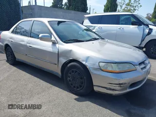 1999 Honda Accord LX z VIN JHMCG5644XC009341, wystawiony jako IAAI lot #42496204 z przebiegiem 144 605 mil mil oraz . Historia ofert i sprzedaży dostępna na DreamBid. Obrazek 1.