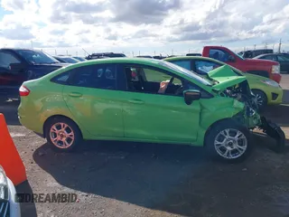 2014 Ford Fiesta SE with VIN 3FADP4BJ2EM203010, listed as a IAAI auction lot 40763881 with 60,803 mi miles. Bid and sale history available at carsss.com. Image 13.