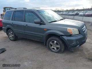 2007 Honda Pilot EX-L with VIN 5FNYF286X7B015235, listed as a IAAI auction lot 41915819 with 310,294 mi miles. Bid and sale history available at carsss.com. Image 6.