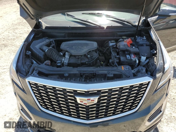 2023 Cadillac XT5 FWD Premium Luxury z VIN 1GYKNCRS0PZ173923, wystawiony jako Copart lot #52212695 z przebiegiem Nie podano mil oraz Szkoda całkowita • Salvage title. Historia ofert i sprzedaży dostępna na DreamBid. Obrazek 12.