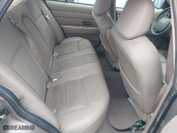 2005 Ford Crown Victoria LX with VIN 2FAFP74W05X174758, listed as a IAAI auction lot 41553606 with 192,103 mi miles. Bid and sale history available at carsss.com. Image 8.