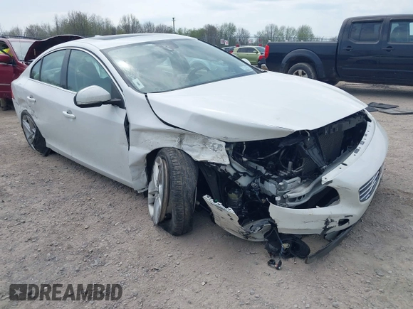 2014 Volvo S60 T5 z VIN YV1612FH8E1292976, wystawiony jako IAAI lot #42129708 z przebiegiem 162 083 mil mil oraz . Historia ofert i sprzedaży dostępna na DreamBid. Obrazek 1.