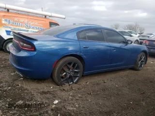 2022 Dodge Charger SXT with VIN 2C3CDXBG1NH112267, listed as a Copart auction lot 77674963 with 68,400 mi miles and Salvage Title. Bid and sale history available at DreamBid. Image 3.