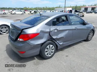 2015 Hyundai Accent GLS with VIN KMHCT4AE8FU861963, listed as a IAAI auction lot 42161059 with 132,629 mi miles and . Bid and sale history available at DreamBid. Image 4.