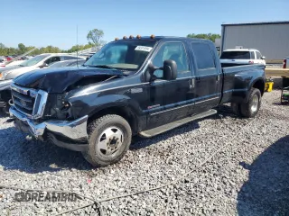 1999 Ford F-350 XL z VIN 1FTWW32FXXEA94588, wystawiony jako Copart lot #69331094 z przebiegiem 376 818 mil mil oraz Szkoda całkowita • Salvage title. Historia ofert i sprzedaży dostępna na DreamBid. Obrazek 1.