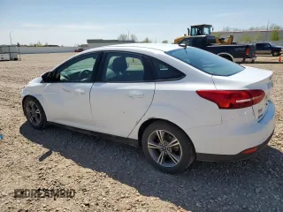 2018 Ford Focus SE with VIN 1FADP3FE0JL227146, listed as a Copart auction lot 56151985 with 124,517 mi miles and Salvage title. Bid and sale history available at DreamBid. Image 2.