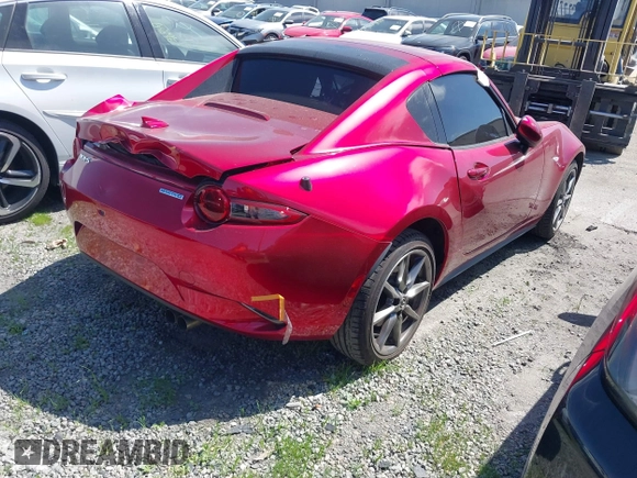 2021 Mazda MX-5 Miata Grand Touring с VIN JM1NDAM71M0459437, выставлен на аукционе IAAI как лот 41808704 с пробегом 19 368 миль миль и . История ставок и продаж доступна на DreamBid. Изображение 4.