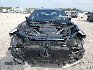 2023 BMW 7 Series 740i z VIN WBA23EH08PCM18586, wystawiony jako Copart lot #46084894 z przebiegiem 6 880 mil mil oraz . Historia ofert i sprzedaży dostępna na DreamBid. Obrazek 5.