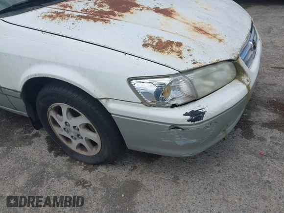 2001 Toyota Camry LE z VIN JT2BF22K310304712, wystawiony jako IAAI lot #42386743 z przebiegiem 103 552 mil mil oraz . Historia ofert i sprzedaży dostępna na DreamBid. Obrazek 6.