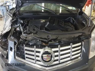 2013 Cadillac SRX Performance Collection with VIN 3GYFNHE37DS530908, listed as a IAAI auction lot 41662796 with 80,254 mi miles. Bid and sale history available at carsss.com. Image 10.