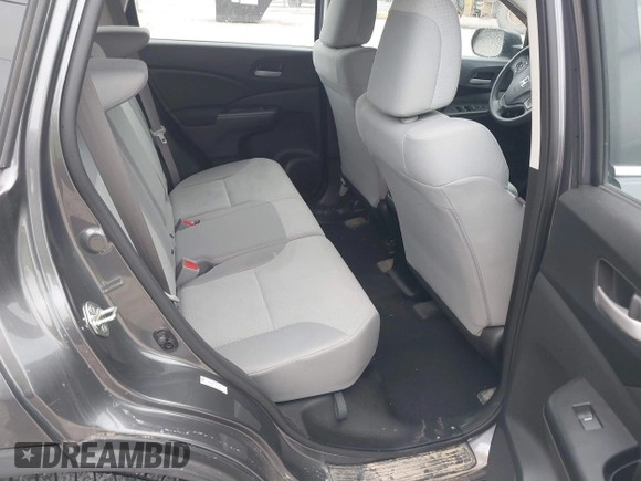 2015 Honda CR-V LX with VIN 2HKRM4H33FH617583, listed as a IAAI auction lot 41805272 with 88,214 mi miles and . Bid and sale history available at DreamBid. Image 8.