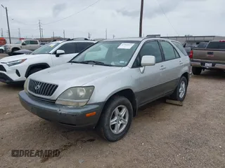 1999 Lexus RX 300 with VIN JT6HF10UXX0083402, listed as a IAAI auction lot 42102612 with 192,697 mi miles and . Bid and sale history available at DreamBid. Image 2.