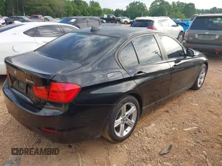 2014 BMW 3 Series 328i with VIN WBA3A5C56EF606175, listed as a IAAI auction lot 42211614 with 152,783 mi miles and . Bid and sale history available at DreamBid. Image 4.