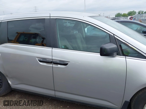 2011 Honda Odyssey LX with VIN 5FNRL5H25BB040287, listed as a IAAI auction lot 42456679 with 129,176 mi miles and . Bid and sale history available at DreamBid. Image 13.