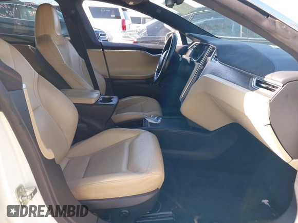 2016 Tesla Model S 70 with VIN 5YJSA1E16GF164264, listed as a IAAI auction lot 40976293 with 68,940 mi miles and . Bid and sale history available at DreamBid. Image 5.