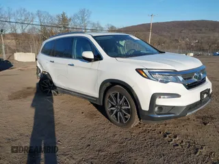 2021 Honda Pilot Touring 8-Passenger z VIN 5FNYF6H96MB038539, wystawiony jako IAAI lot #41704082 z przebiegiem 18 435 mil mil oraz . Historia ofert i sprzedaży dostępna na DreamBid. Obrazek 1.