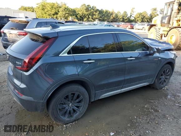 2019 Cadillac XT4 FWD Premium Luxury z VIN 1GYFZCR47KF123621, wystawiony jako Copart lot #69766894 z przebiegiem 68 191 mil mil oraz Szkody całkowita. Historia ofert i sprzedaży dostępna na DreamBid. Obrazek 3.