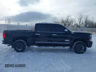 2015 Chevrolet Silverado 1500 High Country with VIN 3GCUKTEC0FG148198, listed as a IAAI auction lot 41493933 with 164,453 mi miles and . Bid and sale history available at DreamBid. Image 13.