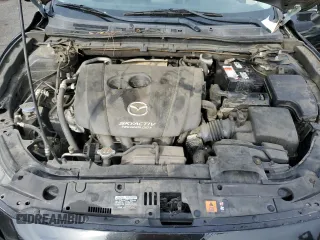 2014 Mazda 3 i Touring z VIN JM1BM1V7XE1122326, wystawiony jako Copart lot #86185154 z przebiegiem 100 067 mil mil oraz Szkoda całkowita • Salvage title. Historia ofert i sprzedaży dostępna na DreamBid. Obrazek 11.