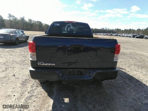2012 Toyota Tundra 2WD Truck with VIN 5TFRM5F11CX041032, listed as a IAAI auction lot 41744471 with 207,330 mi miles. Bid and sale history available at carsss.com. Image 16.