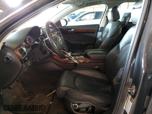 2011 Audi A8 with VIN WAURVAFD4BN004628, listed as a Copart auction lot 52244125 with 182,631 mi miles and Clean title. Bid and sale history available at DreamBid. Image 7.