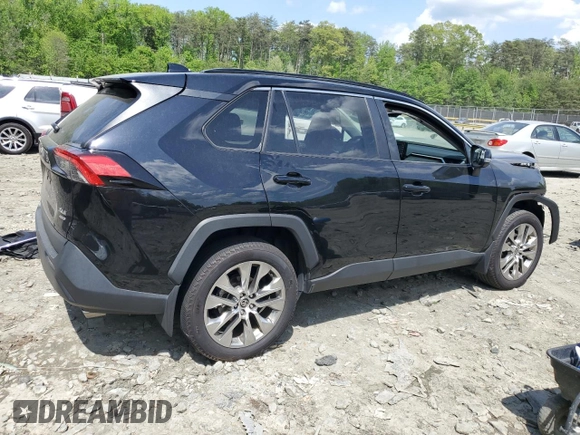 2021 Toyota RAV4 XLE Premium with VIN 2T3A1RFV3MC195877, listed as a Copart auction lot 55220955 with 92,679 mi miles and Salvage title. Bid and sale history available at DreamBid. Image 3.