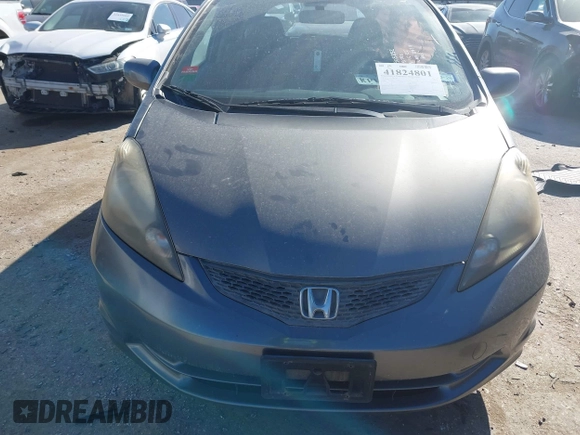 2013 Honda Fit with VIN JHMGE8H36DC082929, listed as a IAAI auction lot 41824801 with 55,858 mi miles. Bid and sale history available at carsss.com. Image 12.