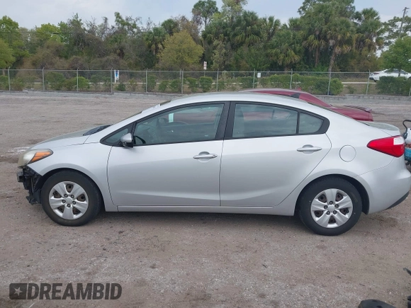 2015 Kia Forte LX with VIN KNAFK4A66F5407229, listed as a IAAI auction lot 41865696 with 124,232 mi miles. Bid and sale history available at carsss.com. Image 15.