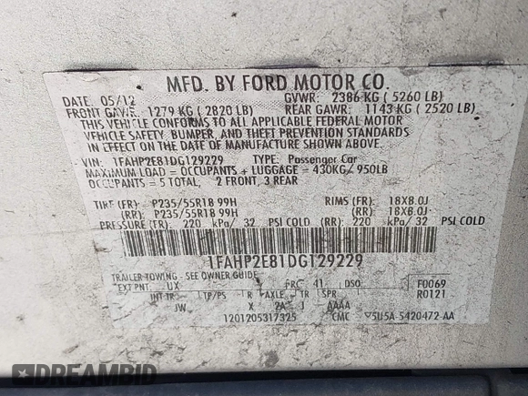 2013 Ford Taurus SEL with VIN 1FAHP2E81DG129229, listed as a IAAI auction lot 41999326 with 205,856 mi miles. Bid and sale history available at carsss.com. Image 9.