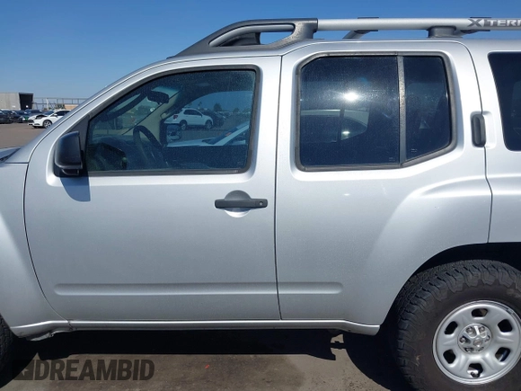2012 Nissan Xterra X with VIN 5N1AN0NWXCC521017, listed as a IAAI auction lot 42136539 with 163,515 mi miles. Bid and sale history available at carsss.com. Image 14.