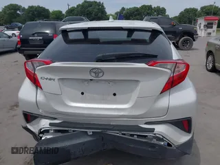 2022 Toyota C-HR XLE z VIN NMTKHMBX2NR144638, wystawiony jako IAAI lot #42063325 z przebiegiem 22 823 mil mil oraz . Historia ofert i sprzedaży dostępna na DreamBid. Obrazek 16.