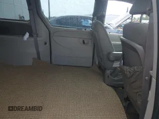 2005 Dodge Caravan SXT with VIN 2D4GP44L45R260651, listed as a Copart auction lot 55804905 with 131,795 mi miles and Salvage Title. Bid and sale history available at DreamBid. Image 11.