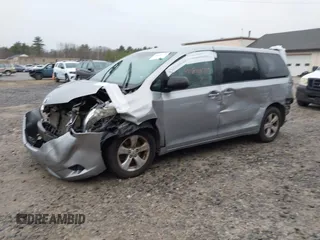 2012 Toyota Sienna with VIN 5TDKA3DC7CS015592, listed as a IAAI auction lot 40839775 with 161,944 mi miles and . Bid and sale history available at DreamBid. Image 2.
