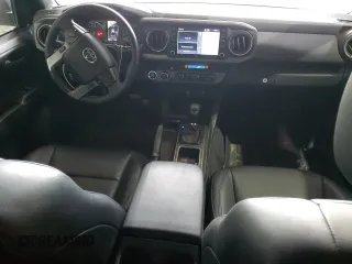 2023 Toyota Tacoma SR with VIN 3TMCZ5AN1PM536781, listed as a Copart auction lot 56674905 with 29,368 mi miles and Salvage title. Bid and sale history available at DreamBid. Image 8.