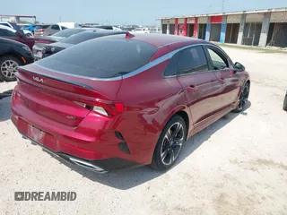 2022 Kia K5 GT-Line z VIN 5XXG64J25NG140300, wystawiony jako IAAI lot #41935077 z przebiegiem 51 279 mil mil oraz . Historia ofert i sprzedaży dostępna na DreamBid. Obrazek 4.