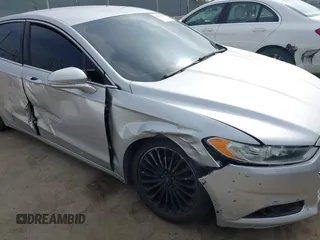 2016 Ford Fusion Titanium z VIN 3FA6P0K92GR135076, wystawiony jako IAAI lot #42604875 z przebiegiem 192 785 mil mil oraz . Historia ofert i sprzedaży dostępna na DreamBid. Obrazek 6.