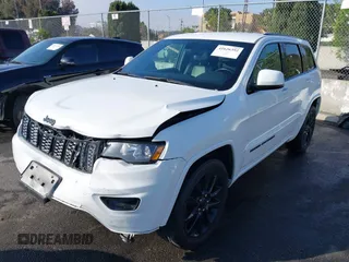 2020 Jeep Grand Cherokee Altitude with VIN 1C4RJEAG2LC306195, listed as a IAAI auction lot 41626392 with 45,587 mi miles and . Bid and sale history available at DreamBid. Image 18.