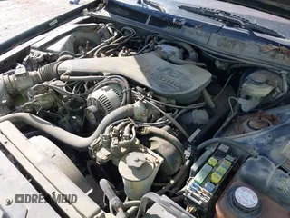 1994 Mercury Cougar z VIN 1MELM62W6RH604333, wystawiony jako IAAI lot #42406748 z przebiegiem 92 504 mil mil oraz . Historia ofert i sprzedaży dostępna na DreamBid. Obrazek 6.