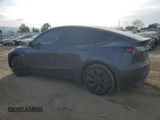 2024 Tesla Model Y with VIN 7SAYGDED5RF105278, listed as a Copart auction lot 44376125 with 12,693 mi miles and Salvage Title. Bid and sale history available at DreamBid. Image 2.